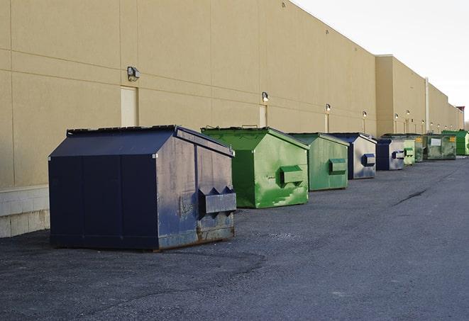 construction dumpsters stacked in a row on a job site in Centreville MI